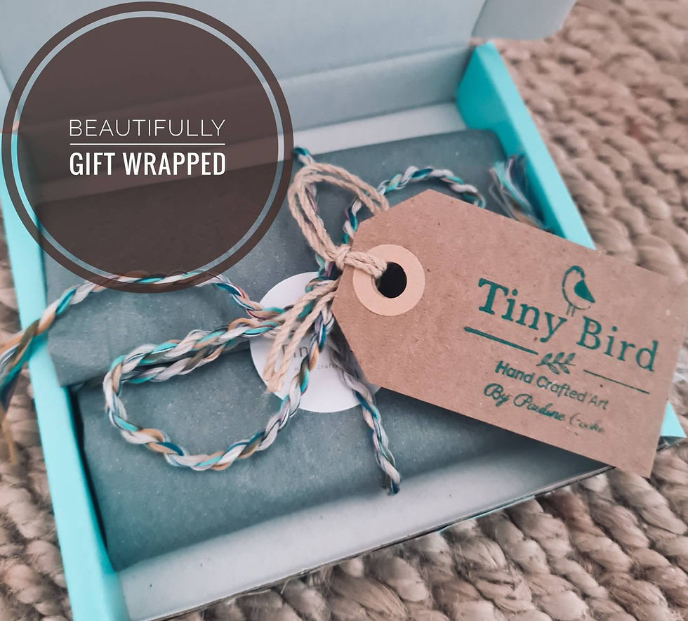 An exquisitely crafted azure ocean resin heart, complete with gift wrapping.