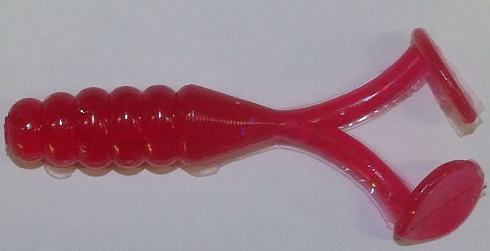 Red double paddled grub soft plastic lure
