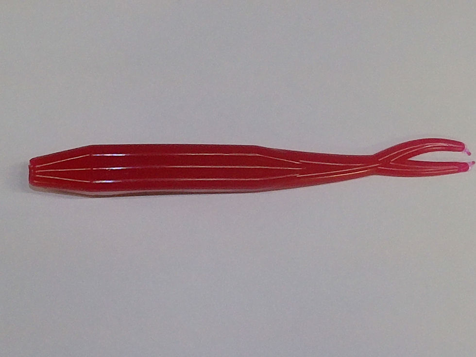 Red soft plastic fishing lure