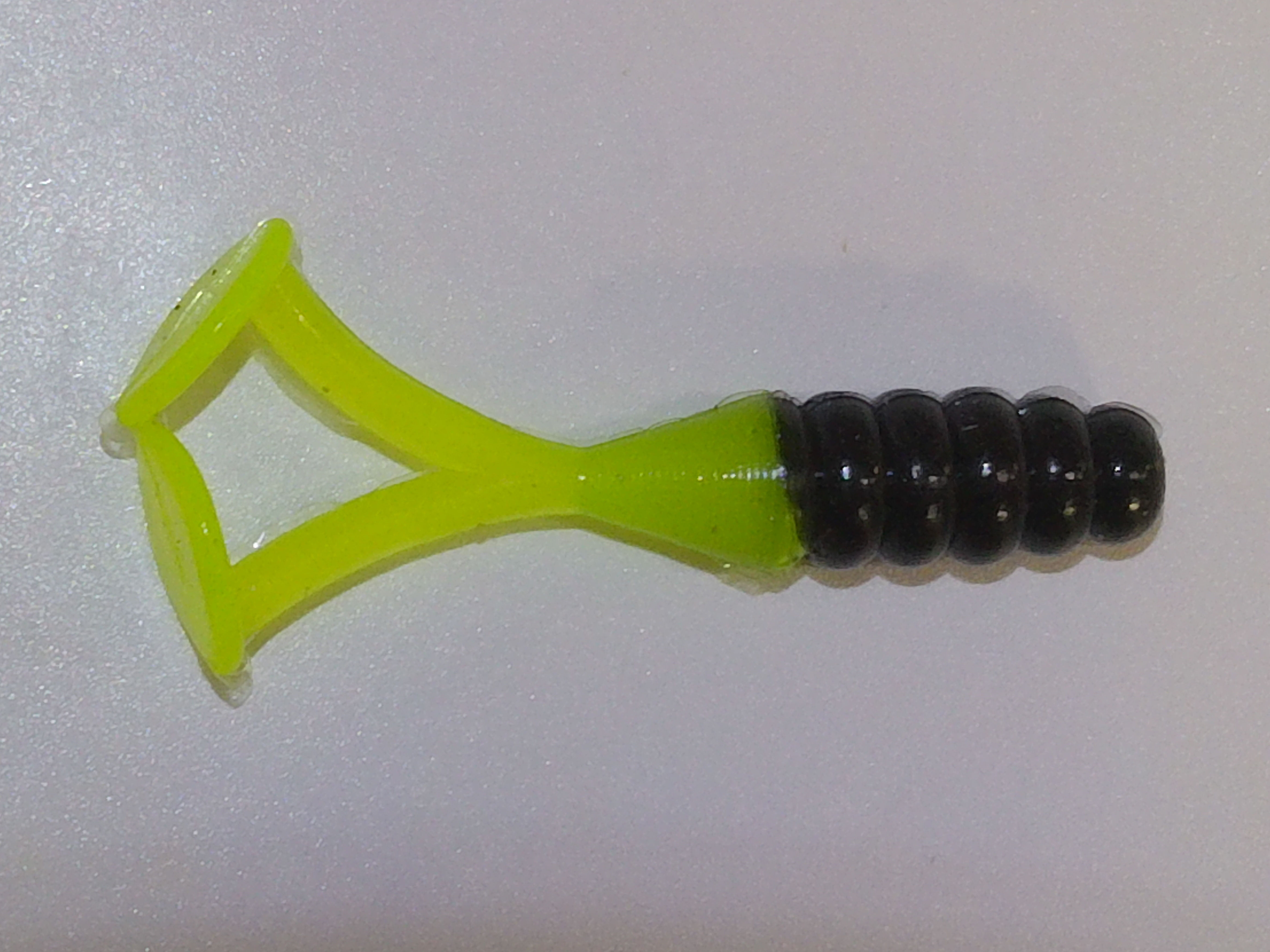 Chartreuse and Black fishing lure designed to improve your fishing sucess