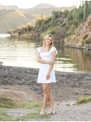 Senior photo at Lake Saguaro. Best lakes in Arizona. Scottsdale based portrait Photographer Jennifer Bowen.  White dress, outfits for grad photos.