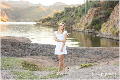 Senior photo at Lake Saguaro. Best lakes in Arizona. Scottsdale based portrait Photographer Jennifer Bowen. White dress, outfits for grad photos.