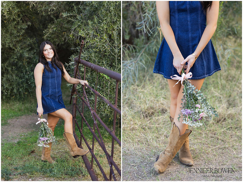 Senior photos at green location in Arizona, olive grove farm. Young woman wears a denim mini dress and brown suede cowboy boots, holding flowers. Photo by Jennifer Bowen