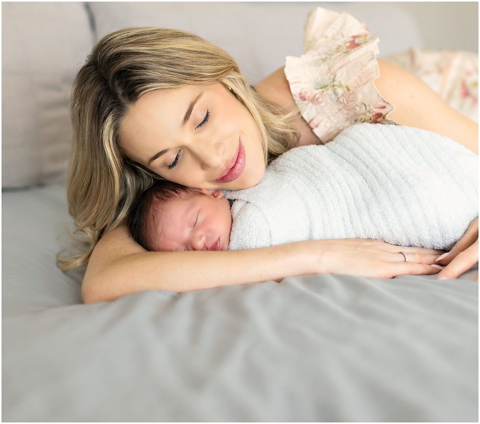 Mom snuggling baby for at home newborn session. Photo by Scottsdale photographer Jennifer Bowen