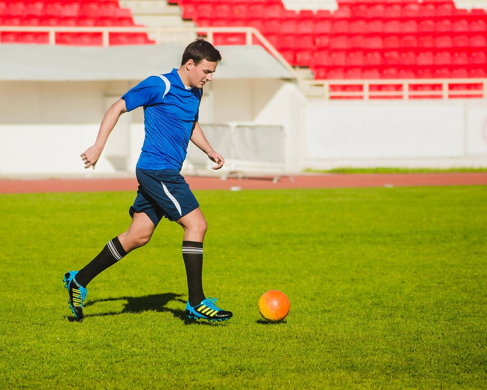 football-player-dribbling_23-2147644495.jpg