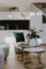 Open-plan kitchen and living area with vibrant decor and bespoke finishes