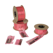 Pink anti-static ESD poly bags on roll for automated packaging of electronic accessories.