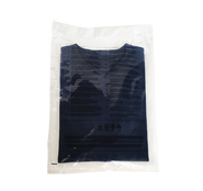 Clear apparel inner bag on a roll packaging a folded t-shirt.