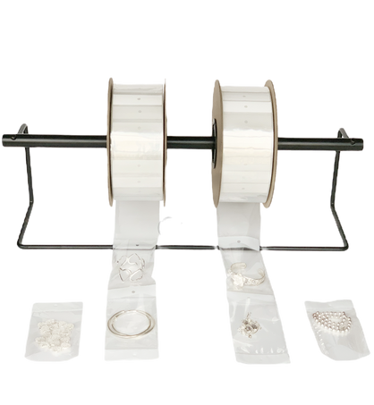 Multiple accessory auto-bagging rolls on rack feeding clear bags for fashion accessories