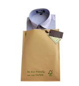 Recyclable Kraft paper auto-bag packaging a shirt for eco-friendly fulfillment.