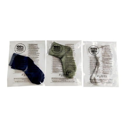 Three small pre-opened bags containing socks and accessories, demonstrating size versatility for small apparel items.