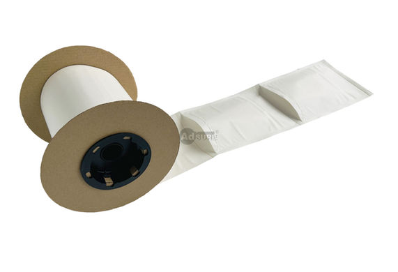 Side view of white kraft paper autobagger bags on roll with individual pouch compartments slightly inflated