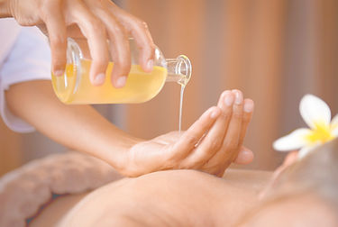 Pouring Massage Oil_edited.jpg