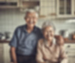 smile old couple on kitchen.jpg