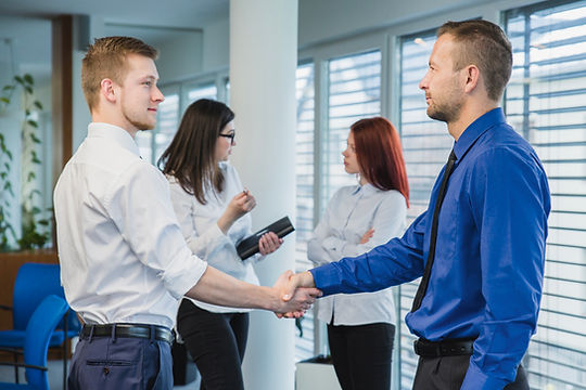 men-shaking-hands-office.jpg