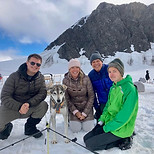 Jonathan with his mother, father, and brother in Alaska