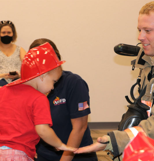 firefighter with kid