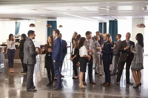 Professionals networking at M&I Flagship Dubai 2025 corporate event