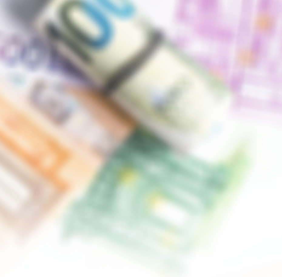Euro in stationery band on pile of paper banknotes five one hundred and fifty euro_edited_