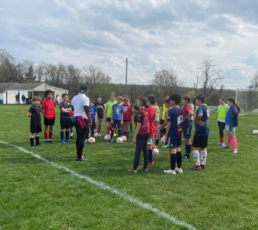 Coach Ian! in action spring 2023