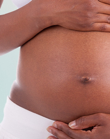 Pregnant woman with morning sickness seeing a qualified acupunctrist