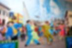 painting of a mural done by elton a local southwest detroit painter. showing latinos dancing in the 1950s era detroit
