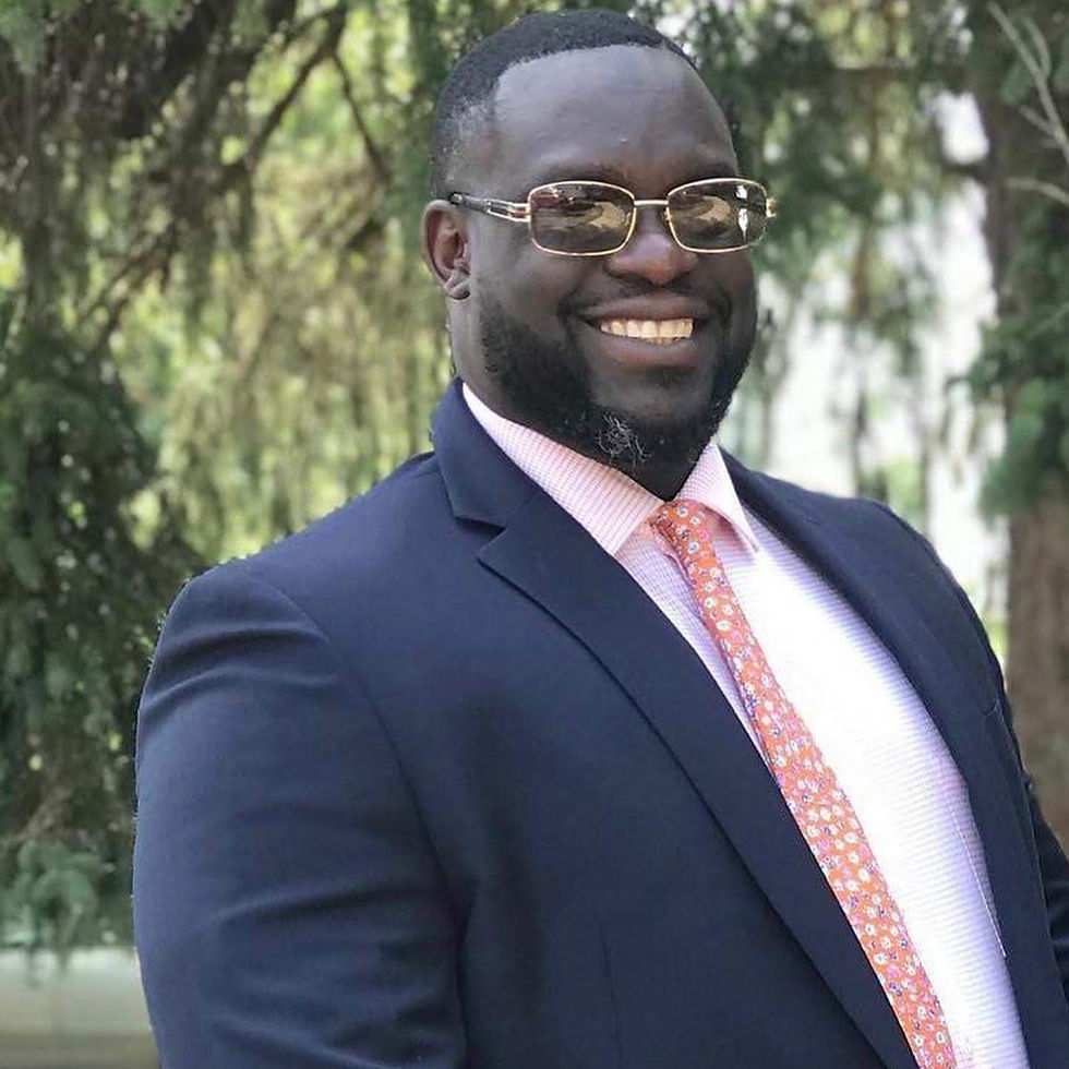 image of owner thomas carey in a suit