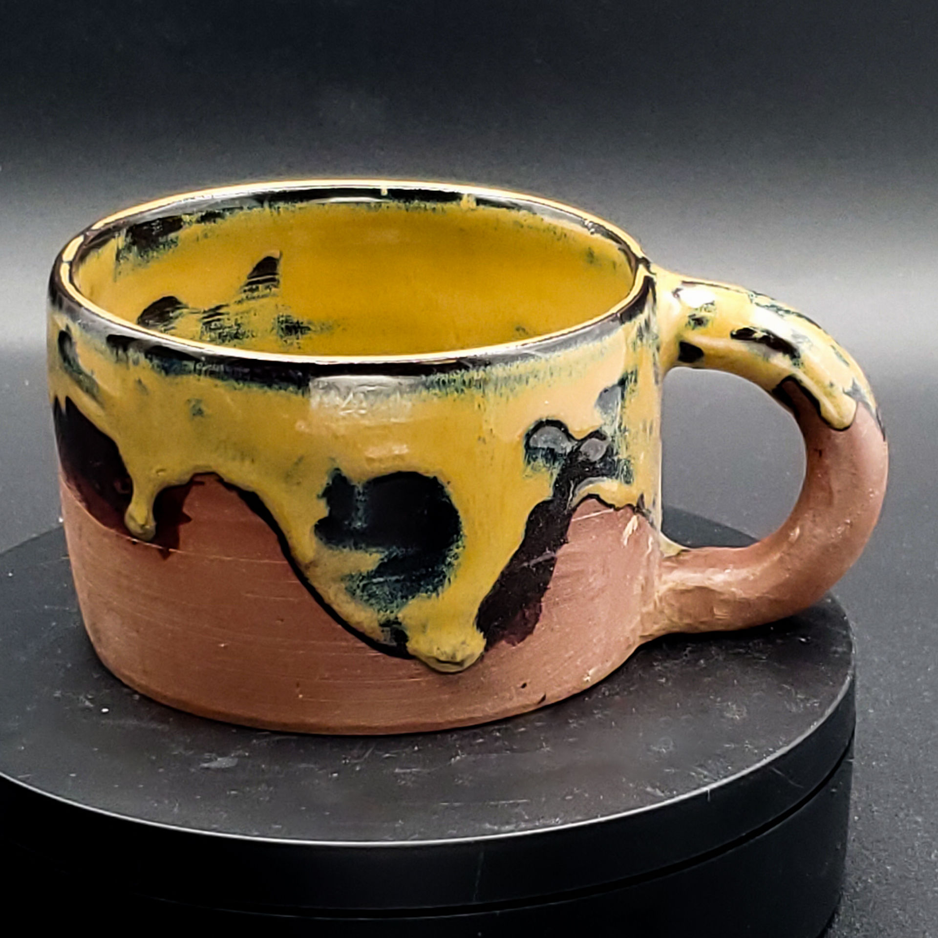 Dark Clay Coffee Cup with Dripping Yellow and Brown Glazing