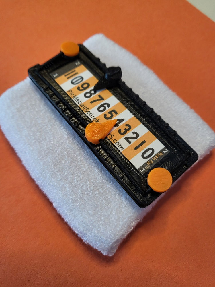 Thumbnail: Orange and Black Pickle Pal (wristband included)