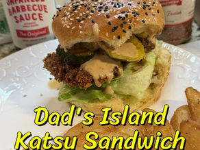 Dad’s Island Pork Katsu Sandwich with crispy chicken, lettuce, pickles, and creamy island sauce