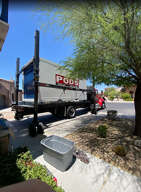 X Man Secure Movers loading a POD storage container in the Phoenix metro area