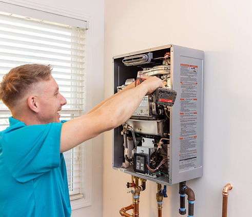Smooth Saling plumber servicing a gas appliance