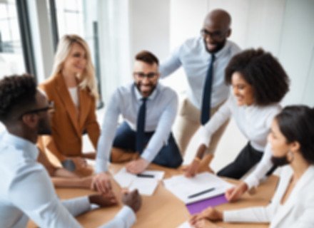 diverse group in a professional office setting showing teamwork.jpg