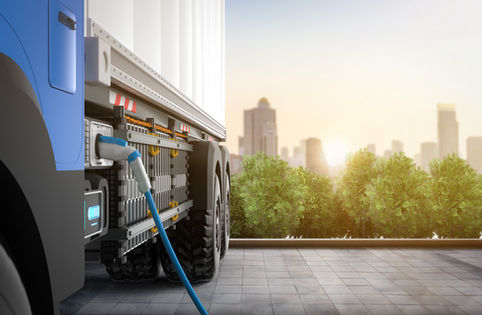 commercial electric vehicle logistic truck charging in the city