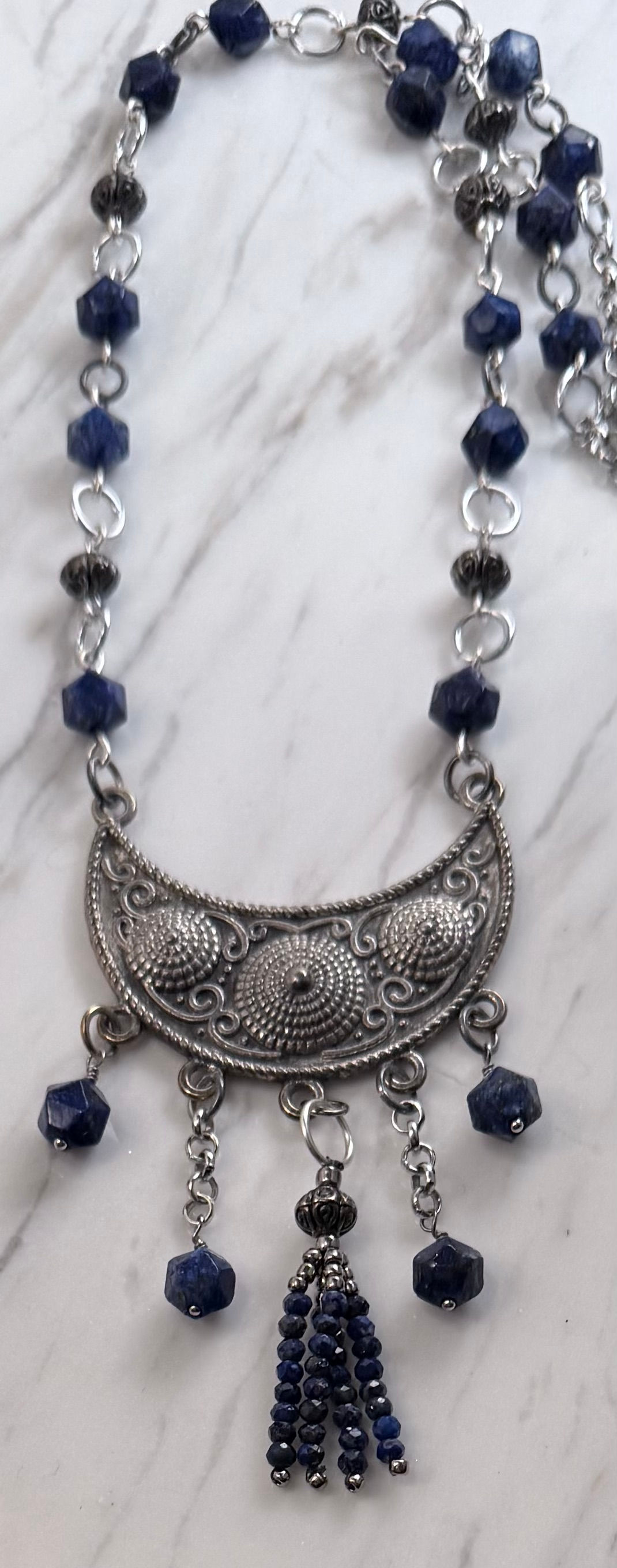 Blue Gemstone Necklace Featuring Pendant
