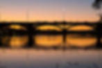 Austin Texas bridge over the river at sunset.