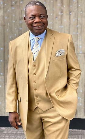 Apostle's Headshot with Beige Suit.jpg