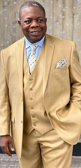 Apostle's Headshot with Beige Suit.jpg