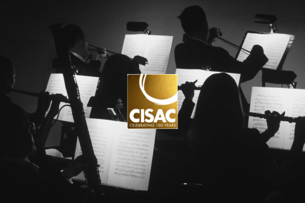 CISAC Logo overlayed an orchestra in black & white.