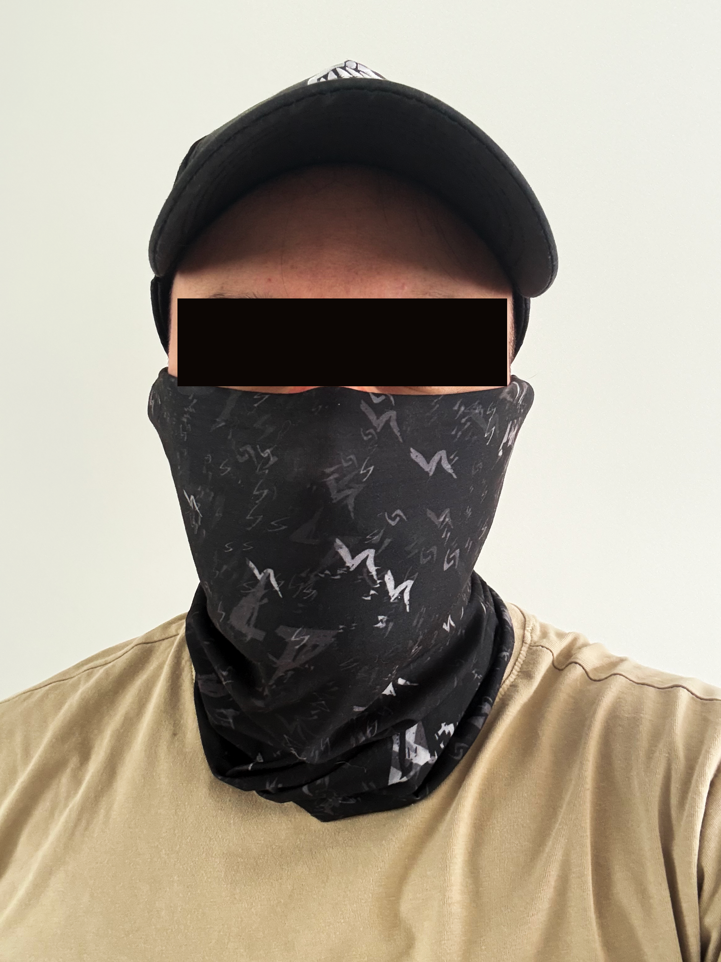 Black seamless tactical neck gaiter with cult-inspired markings and monochrome pattern