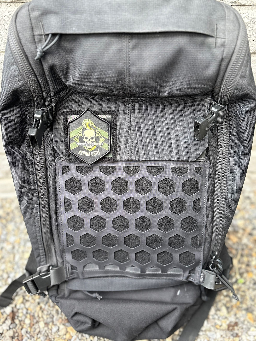 Thumbnail: Battlefield 6 Pax Armata Kahina Unite patch mounted on a black tactical backpack
