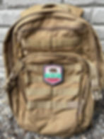 Thumbnail: Battlefield 6 The 323 woven patch with shield emblem and multicolour design on 5.11 brown backpack