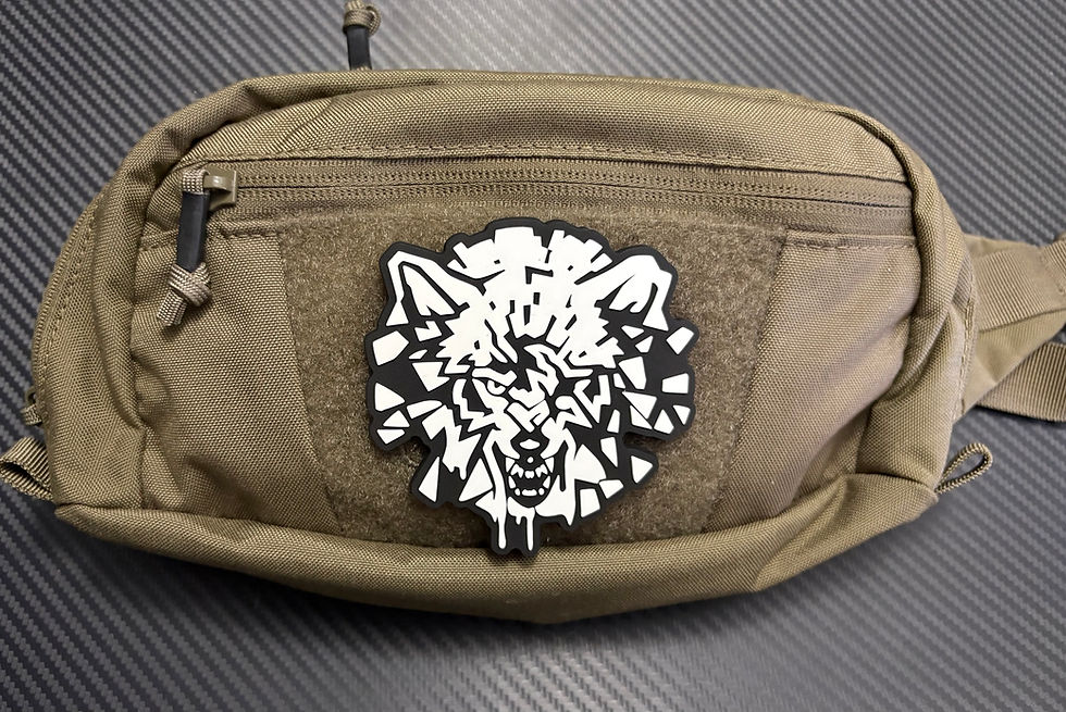 Thumbnail: Scav Logo PVC morale patch mounted on a tactical utility pouch