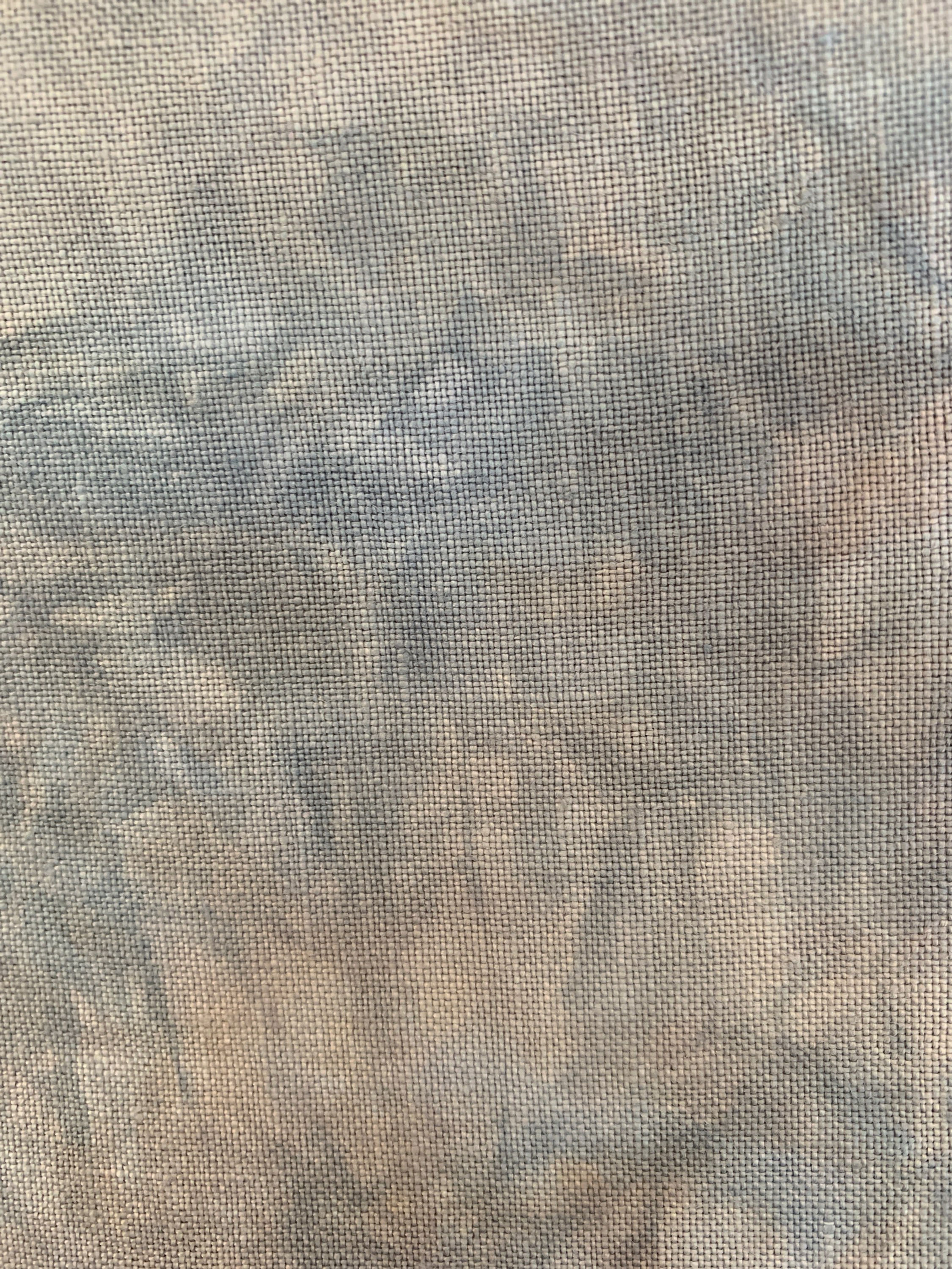 tan blue and marbled fabric