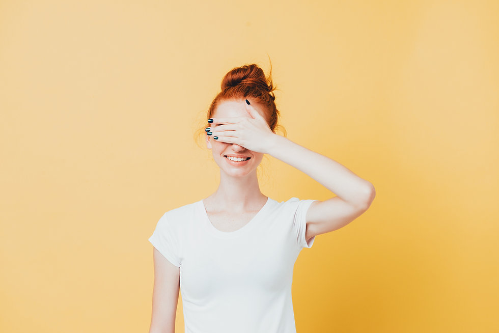 smiling-ginger-woman-t-shirt-covering-her-face (Priime Bounty).jpeg