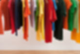 Colorful clothing on hangers