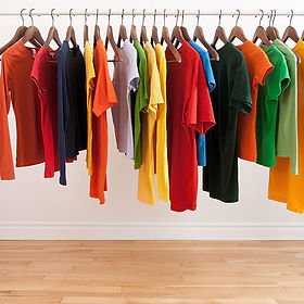 Colorful clothing on hangers