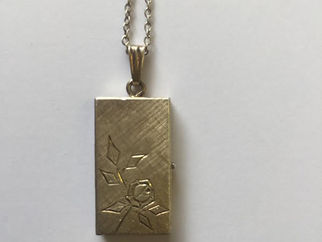 Found Locket on sandy path