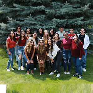 Class of 2025 students posing together (about 17 students)
