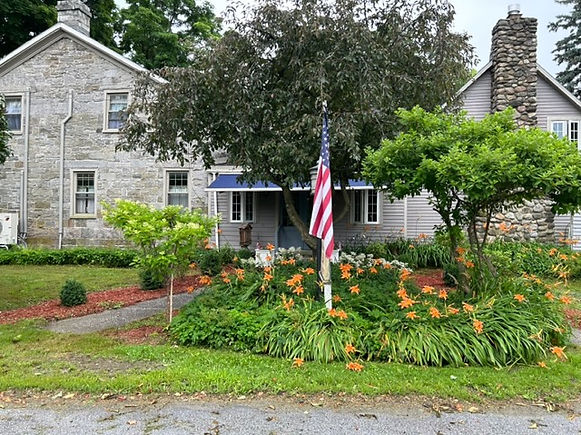 Historic stone inn with gardens